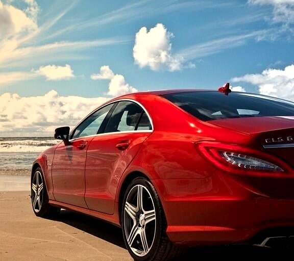 Red Mercedes CLS 63 AMG Parked on the Beach