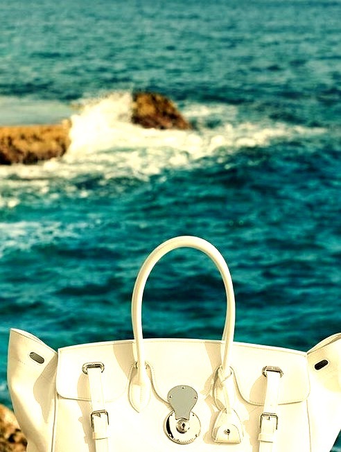 White Ralph Lauren Fashion Bag Infront of the Ocean